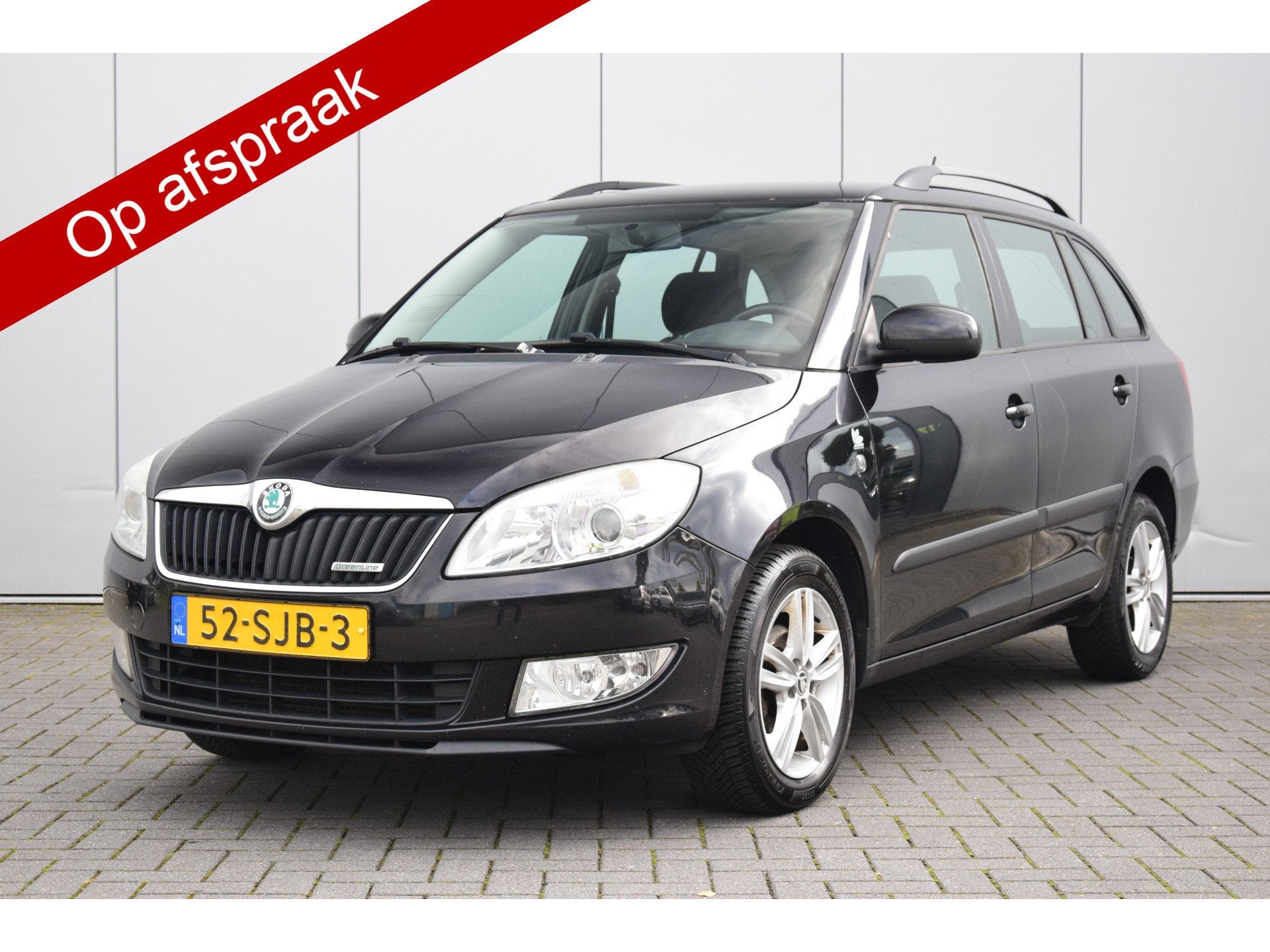 Skoda Fabia Combi 1.2 TDI Greenline Airco Cruise Dakrails, Auto's, Voorwielaandrijving, Euro 5, Zwart, 1199 cc