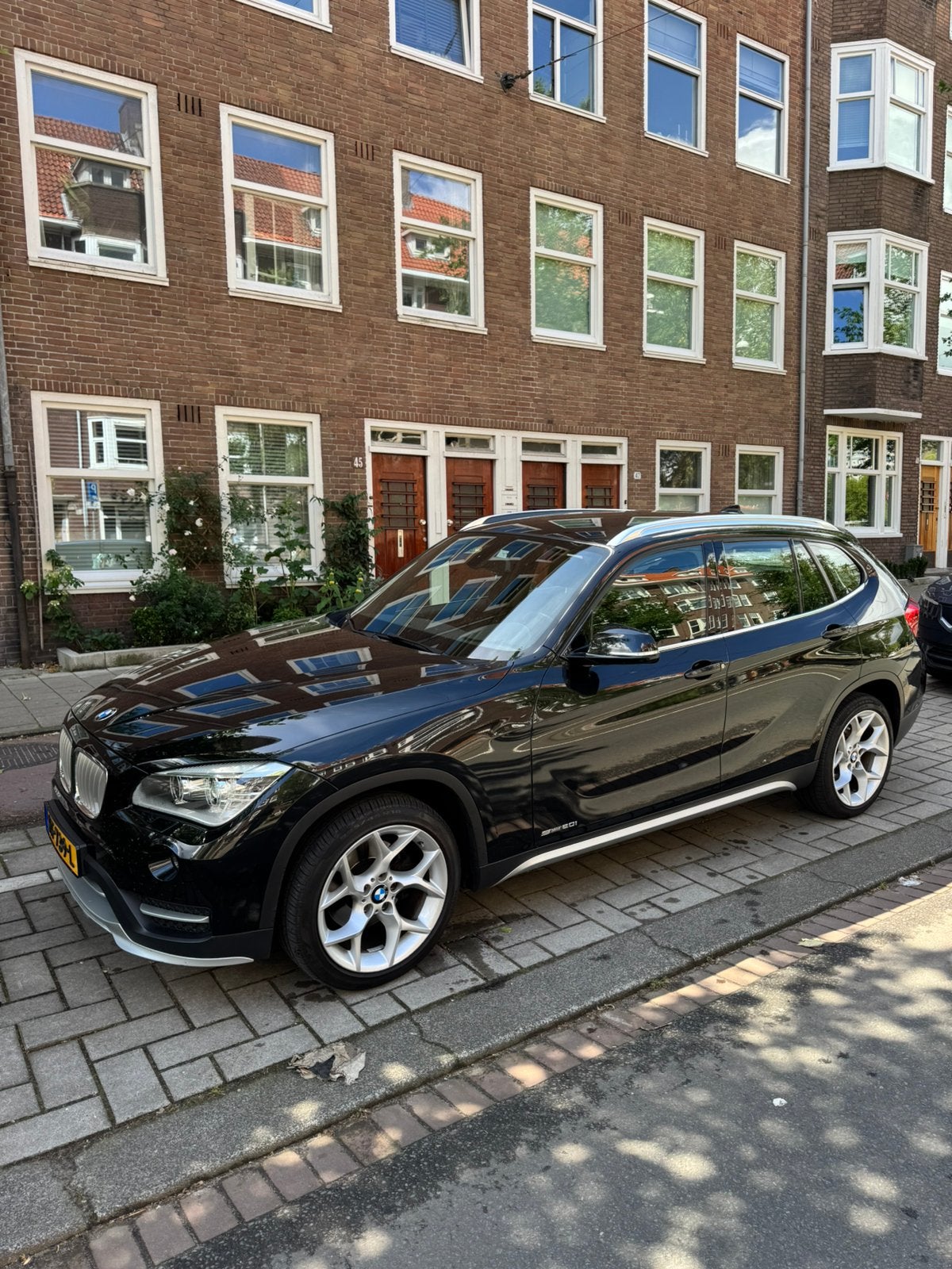 BMW X1 2.0 Sdrive 20I AUT 2015 Zwart, Auto's, BMW, 1800 kg, 4 cilinders, Zwart, Origineel Nederlands