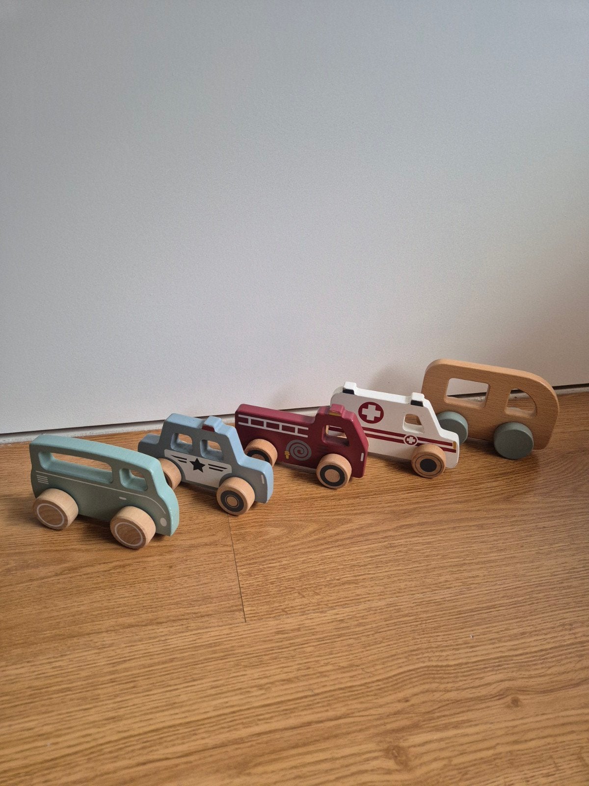 Houten speelgoedvoertuigen set, Ophalen