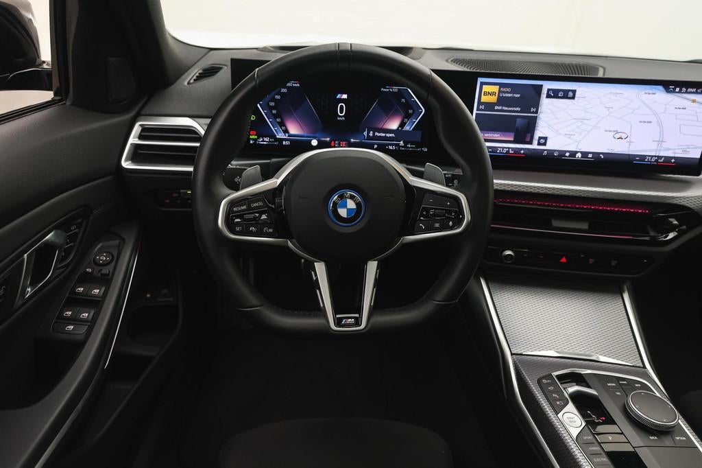 BMW 3 Serie Touring 330e xDrive High Executive M Sport Autom, 1998 cc, Stof, Zwart, 4 cilinders