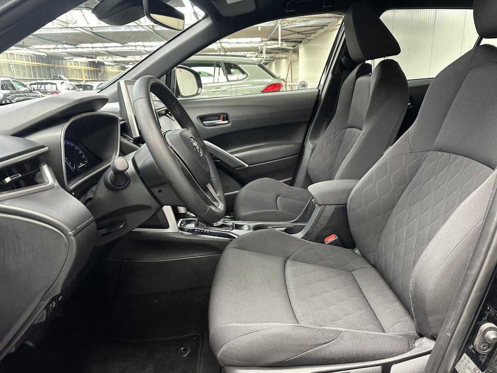 Toyota Corolla Cross Hybrid 140 Style, Auto's, Toyota, Stof, Gebruikt, Zwart, Origineel Nederlands