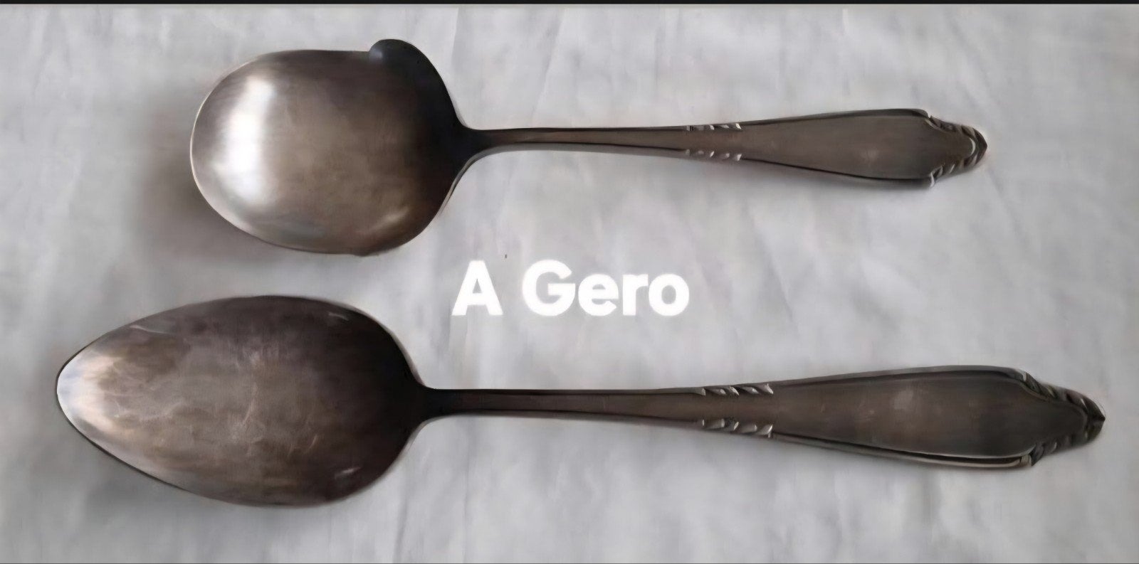 A Gero 90 verzilverde grote lepels relief bewerkte handgrepe, Antiek en Kunst, Ophalen of Verzenden