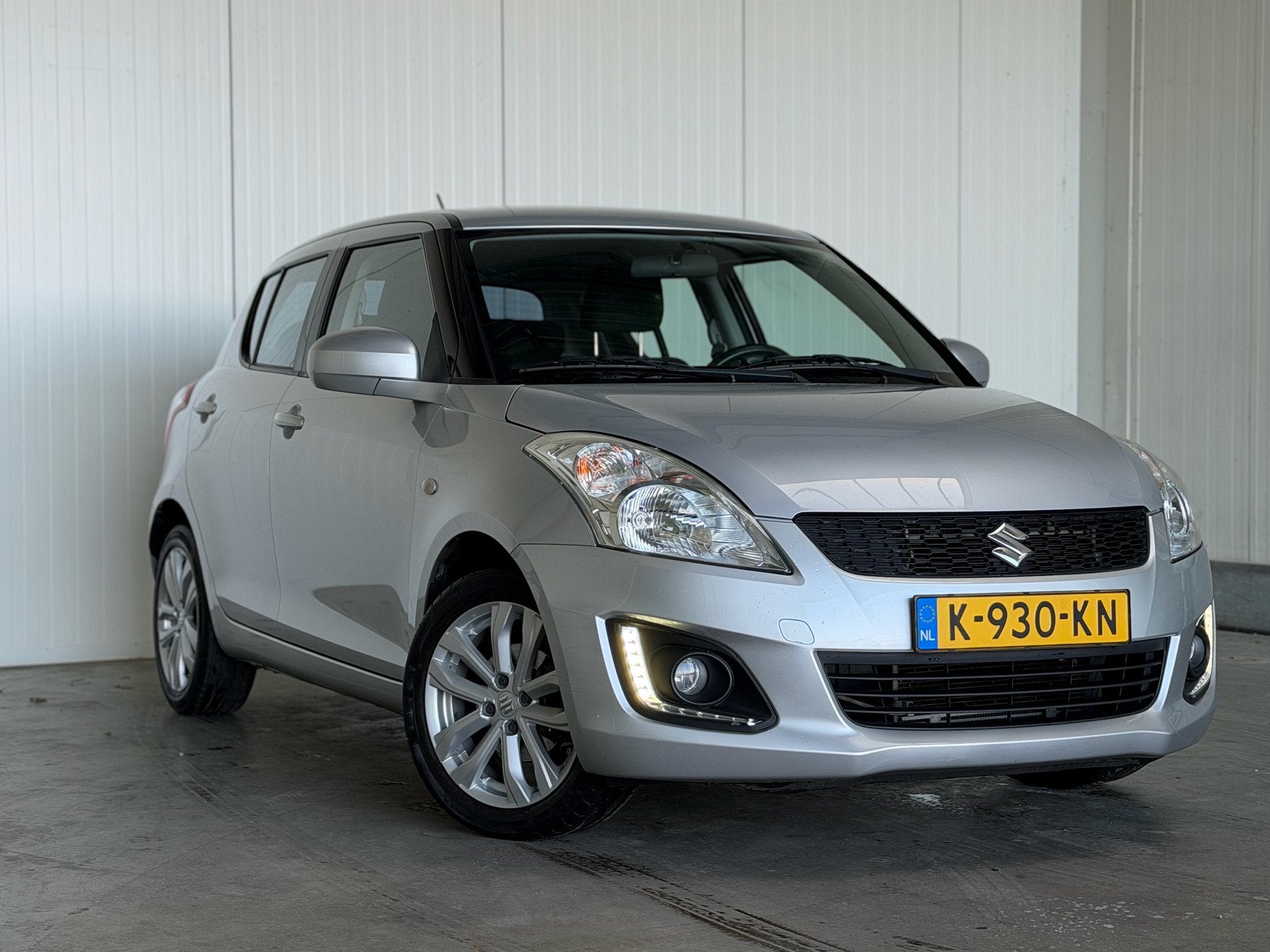 Suzuki Swift 1.2 Exclusive Dealer OH! (bj 2015, automaat), Auto's, Suzuki, Euro 5, 4 cilinders, 965 kg, Swift