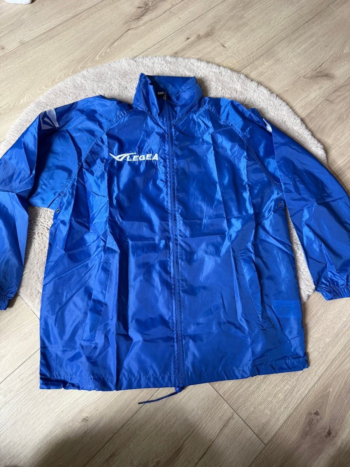 Legea blauwe regenjas maat M, Ophalen of Verzenden, Nieuw, Blauw, Voetbal