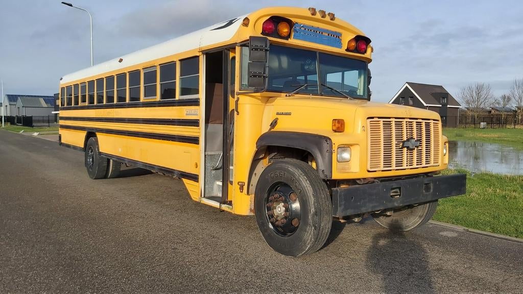 AMERIKAANSE school bus BENZINE/LPG, Auto's, Particulier, Te koop