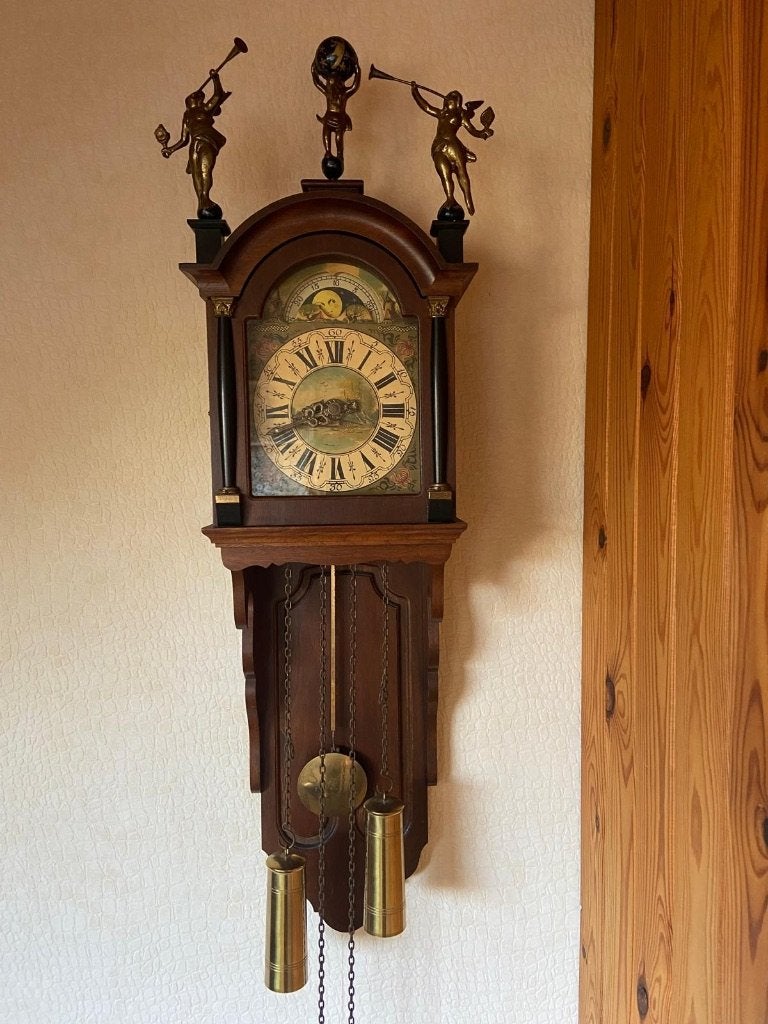 Wandklok, Friese staartklok, Ophalen