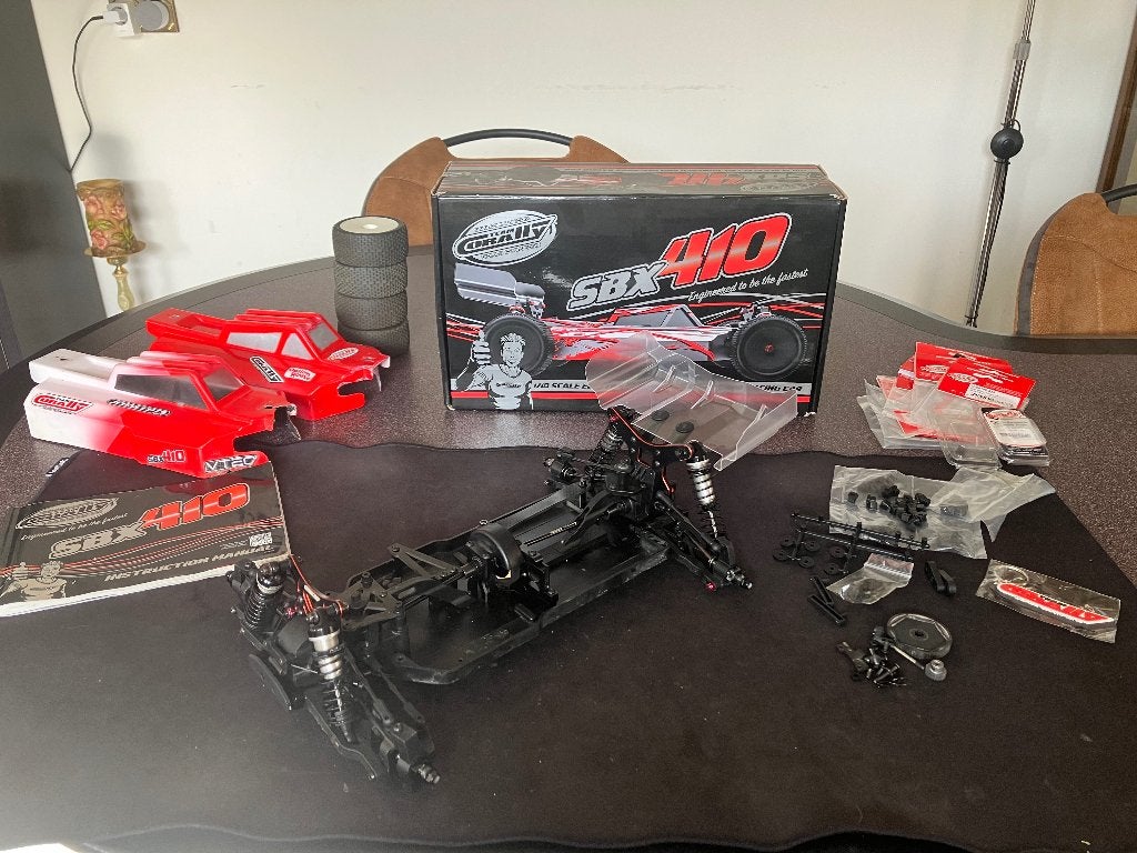 Team Corally SBX 410 Kit (roller), Elektro, Gebruikt, Auto offroad, Ophalen of Verzenden