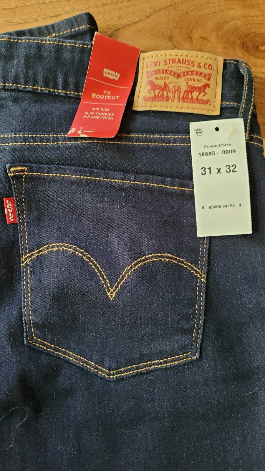 Levi 715 bootcut donkerblauw. Nieuw mt 31, Blauw, Nieuw, Ophalen of Verzenden, W30 - W32 (confectie 38/40)