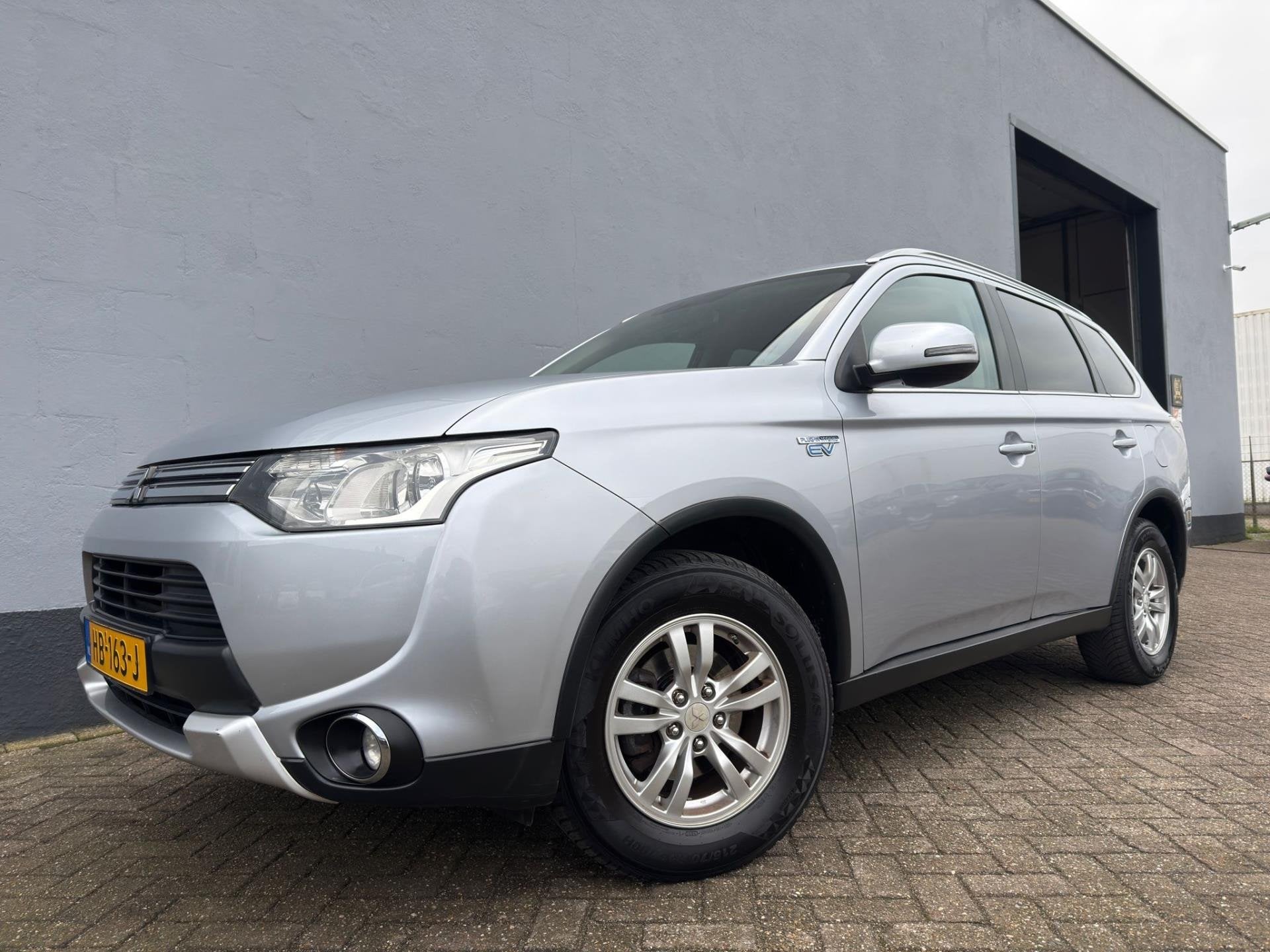 Mitsubishi Outlander 2.0 PHEV Business Edition - Trekhaak, Auto's, Mitsubishi, 4 cilinders, Vierwielaandrijving, Hybride Elektrisch/Benzine