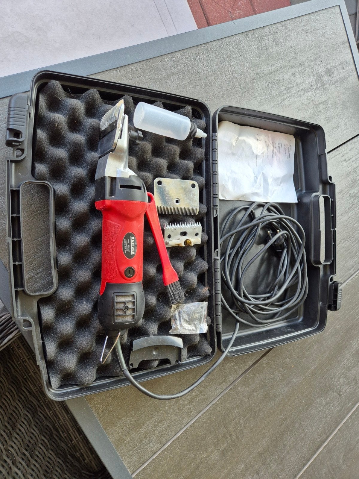 kneizer hondentondeuse, Ophalen