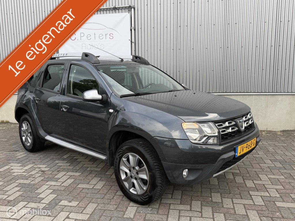 Dacia Duster 1.2 TCe 4x2 Prestige 2016 / Navigatie / Trekhaa, Auto's, Gebruikt, Euro 6, Duster, 635 kg