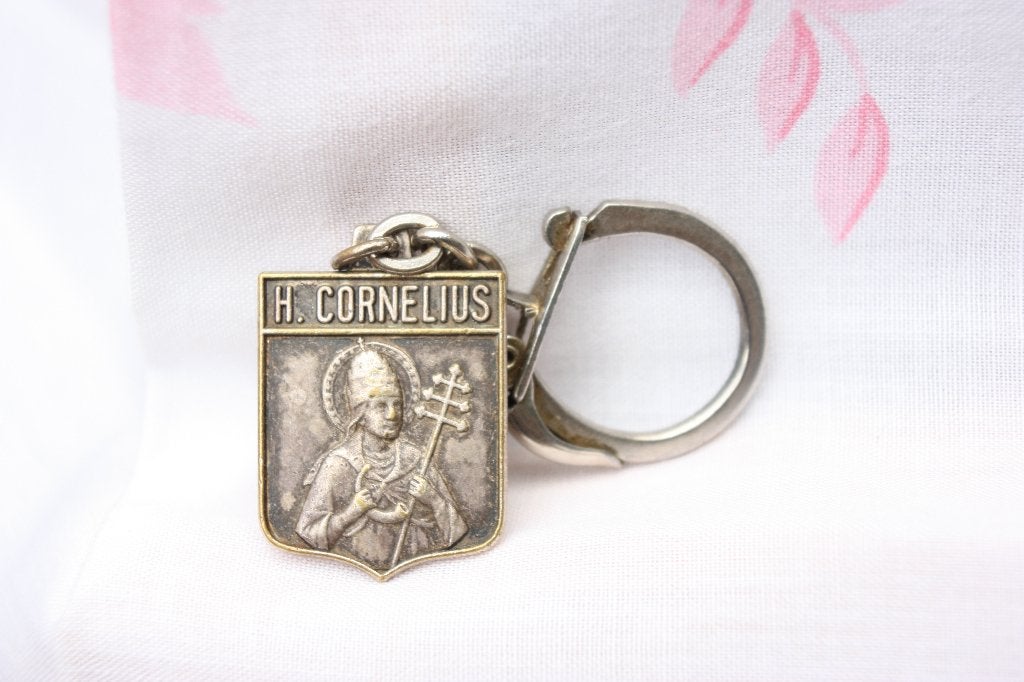 Oude sleutelhanger H. Cornelius Kom veilig thuis mooi, Ophalen of Verzenden, Gebruikt, Overige typen, Christendom | Katholiek