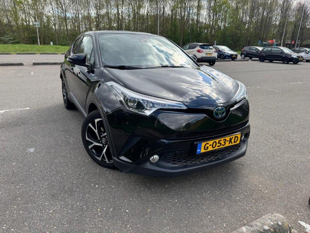 Toyota C-HR 1.8 Hybrid Team D rijk uitgerust !!!, Auto's, 725 kg, 4 cilinders, Overige bekleding, Zwart