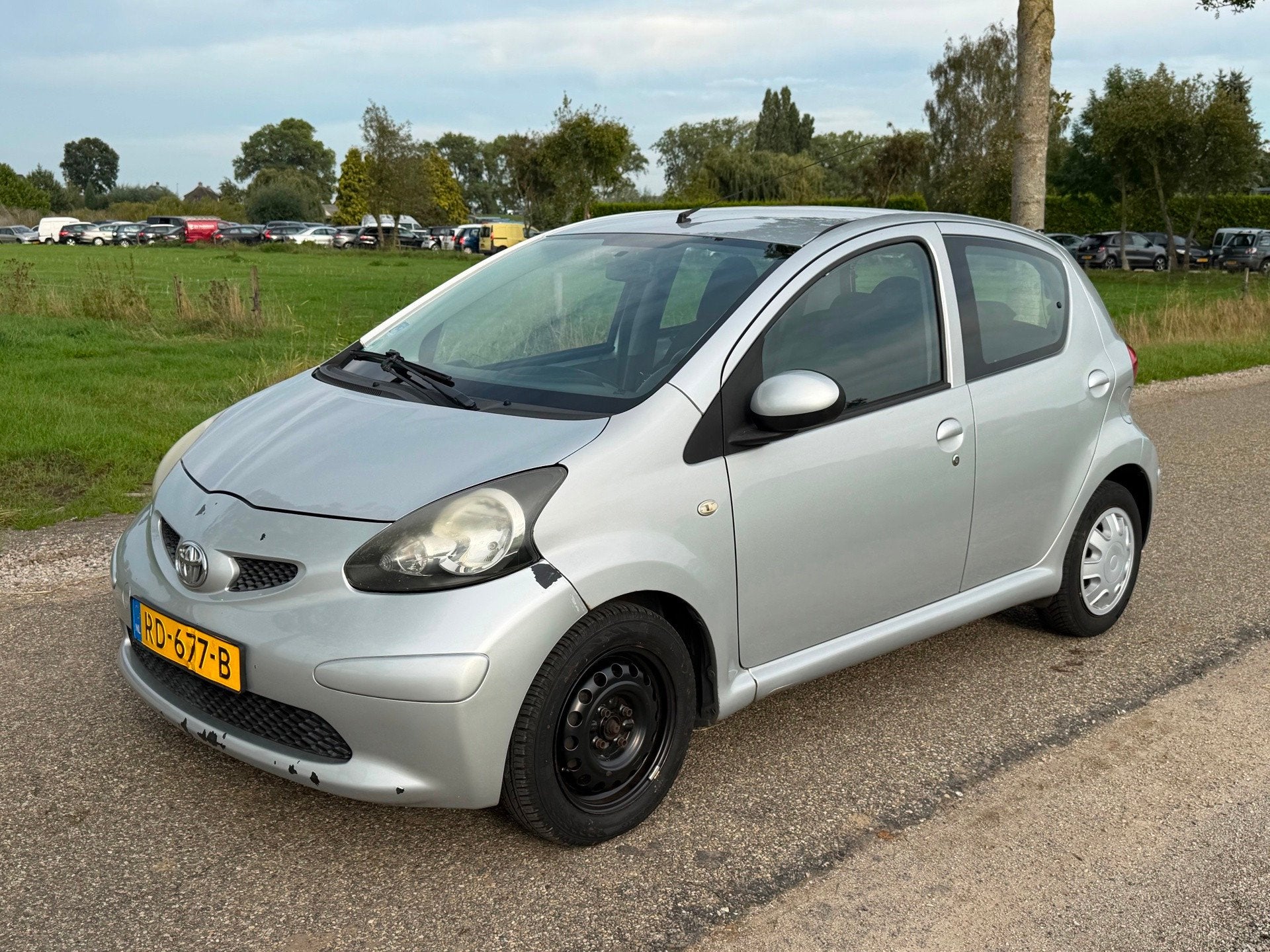 Toyota Aygo 1.0-12V 5Drs Airco NAP APK 11-2026, Auto's, Voorwielaandrijving, Stof, Gebruikt, Zwart