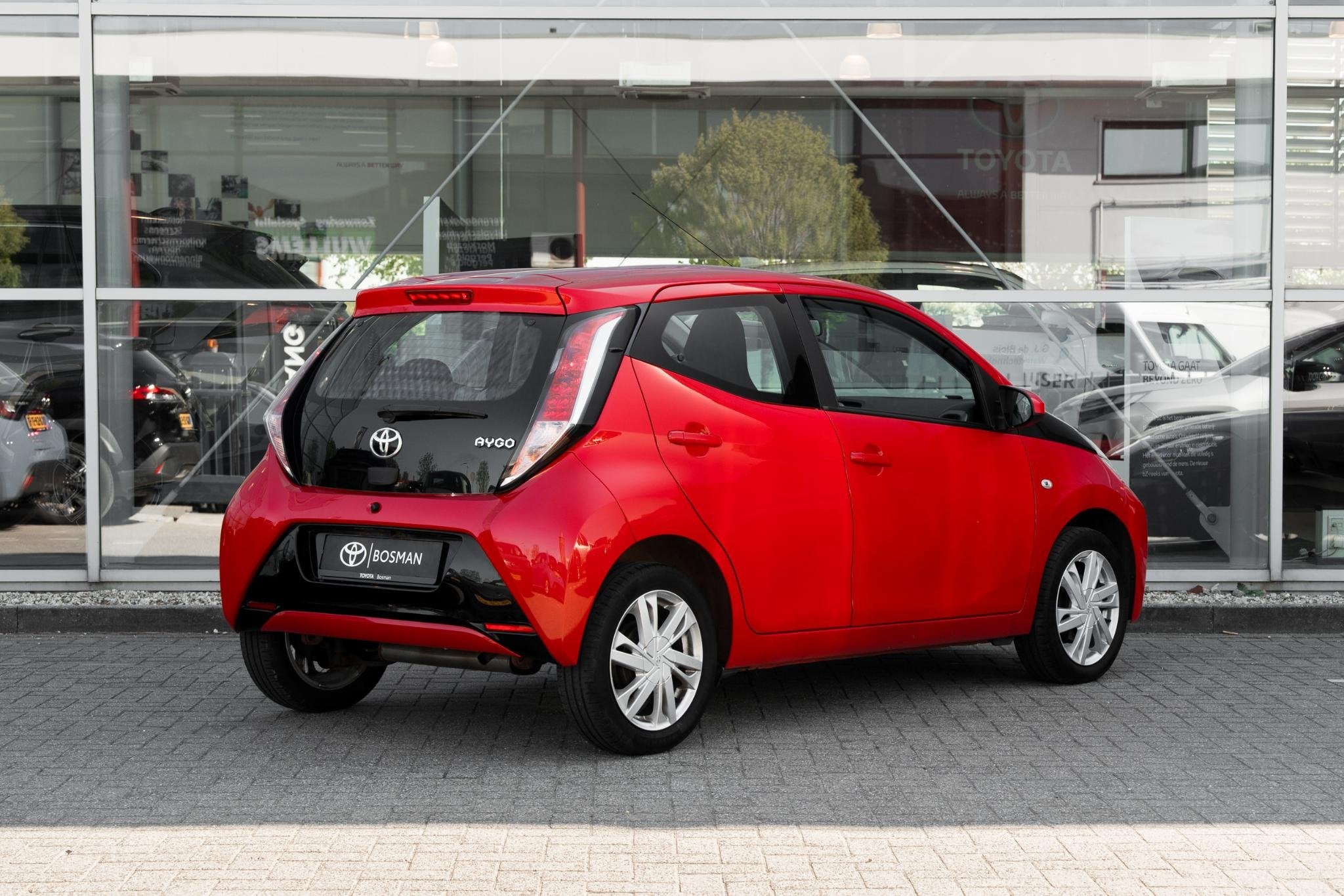 Toyota Aygo 1.0 VVT-i x-cite, Auto's, Stof, Gebruikt, Euro 6, 4 stoelen