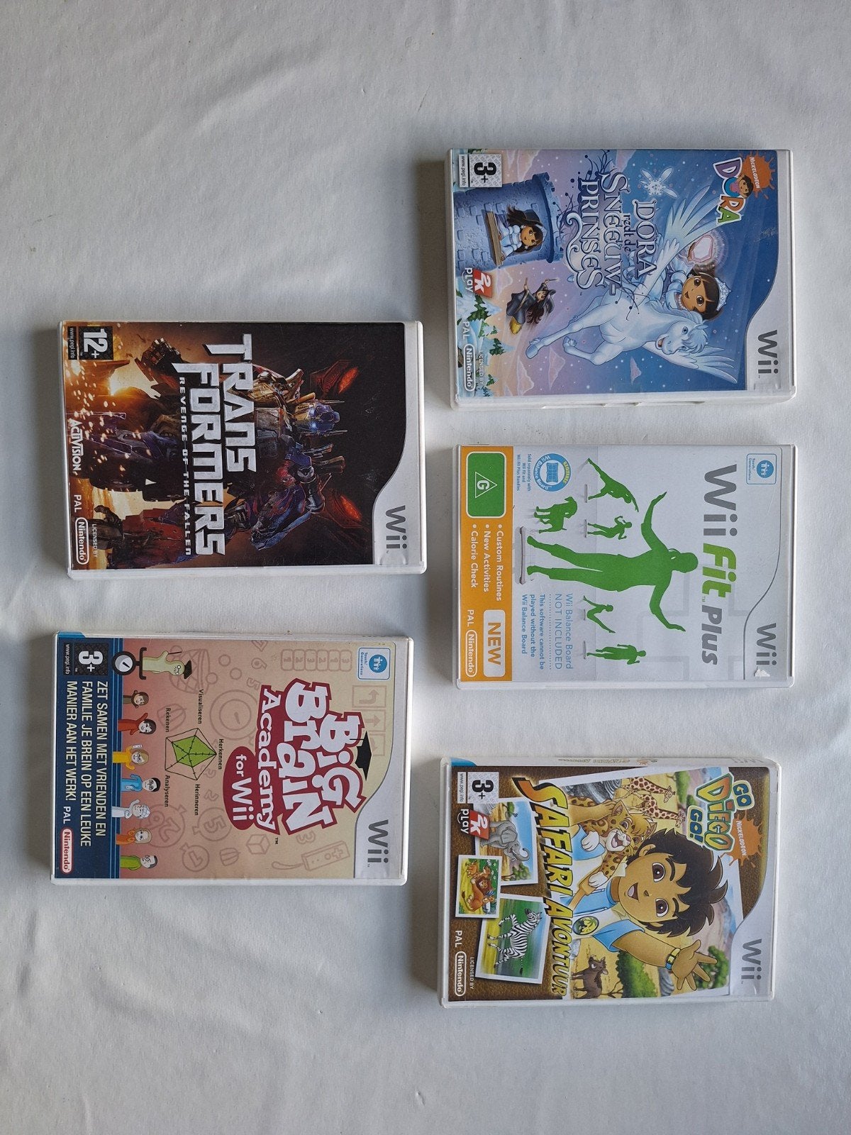 Wii Spellen: Dora, Transformers, Wii Fit Plus, Big Bra, Spelcomputers en Games, Games | Nintendo Wii, Ophalen of Verzenden, Gebruikt