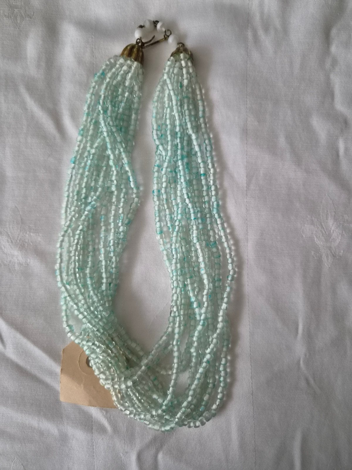 Mooie kralenketting in wit en lichtblauw, Sieraden, Tassen en Uiterlijk, Kettingen, Ophalen of Verzenden, Gebruikt, Wit, Overige materialen