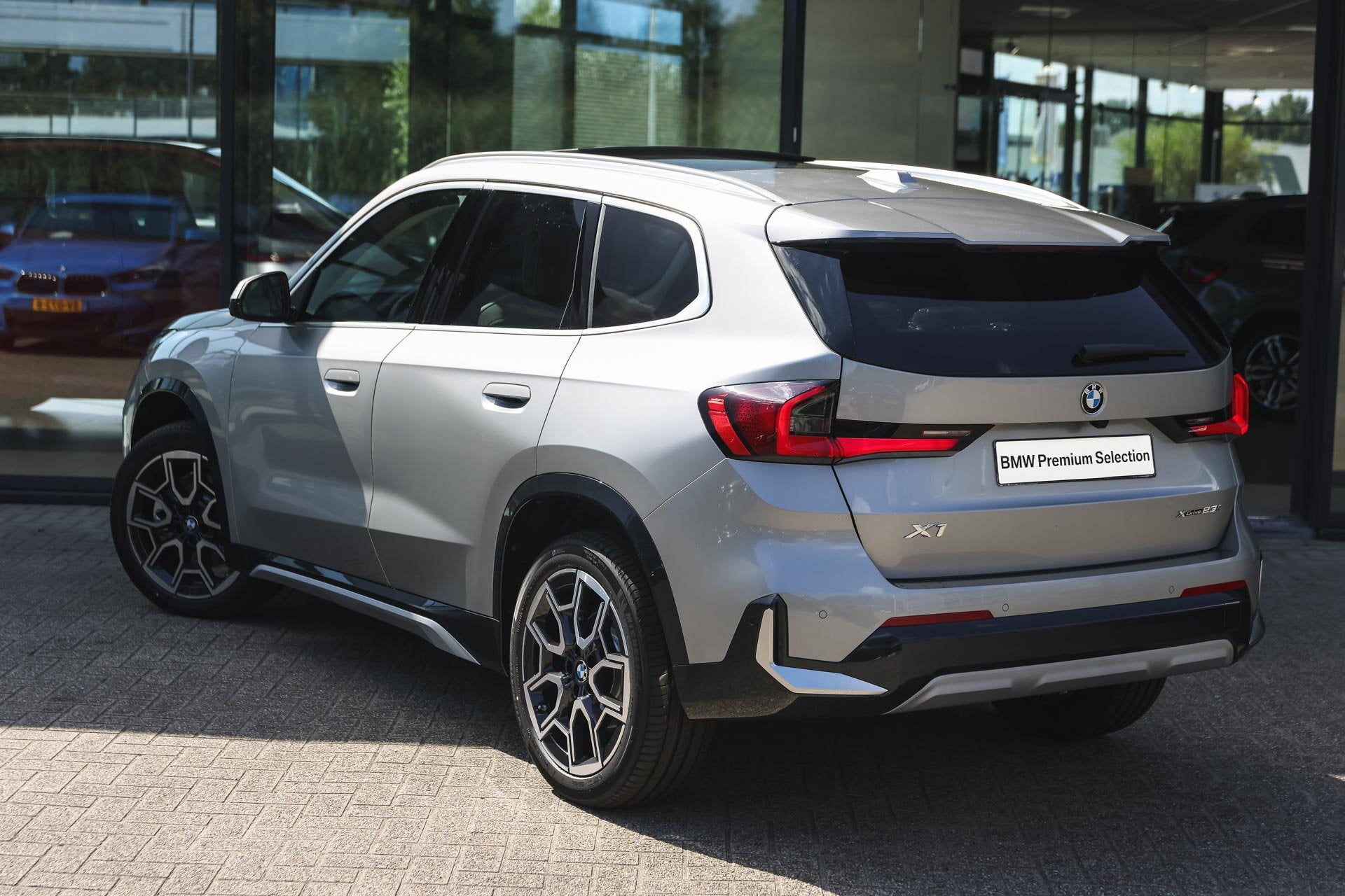 BMW X1 xDrive23i Automaat / Panoramadak / Trekhaak / Sportst, Auto's, Euro 6, 4 cilinders, Isofix, Vierwielaandrijving