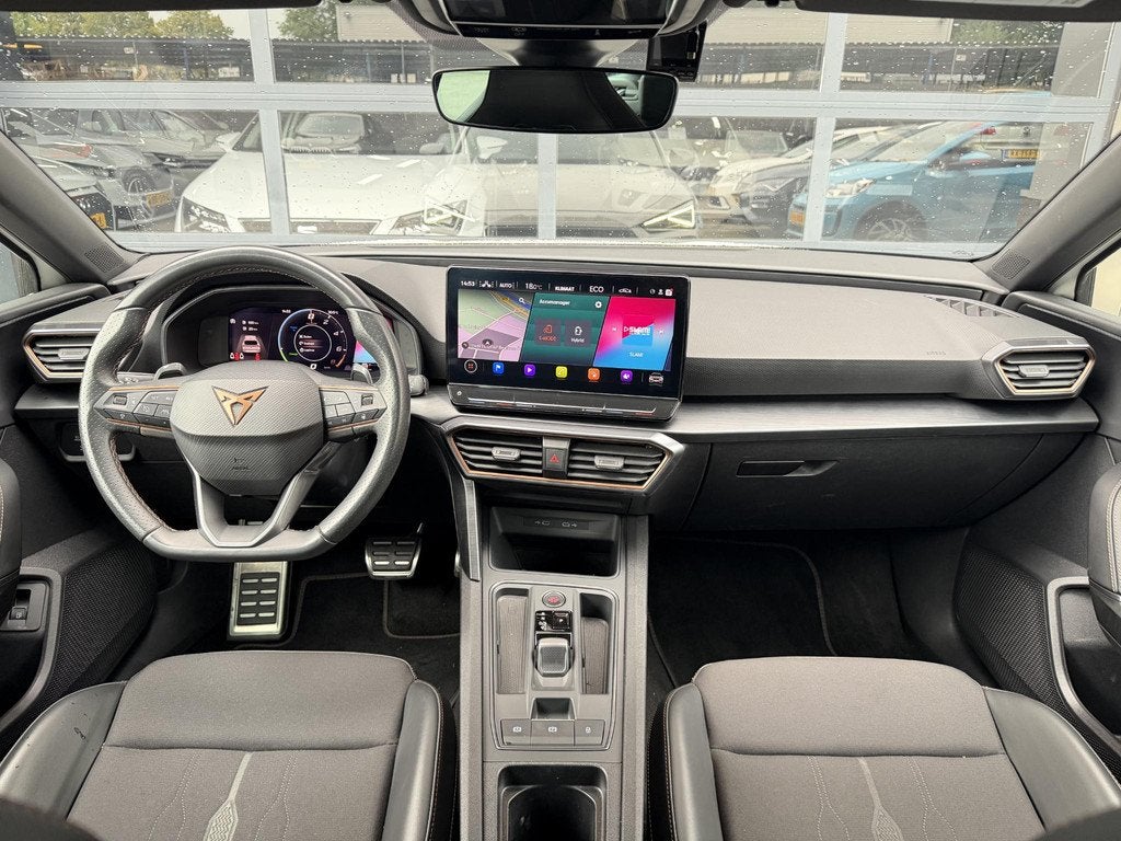 CUPRA Leon Sportstourer 1.4 e-Hybrid VZ CarPlay | Camera | 2, Auto's, Cupra, Stof, Gebruikt, 4 cilinders, 1589 kg
