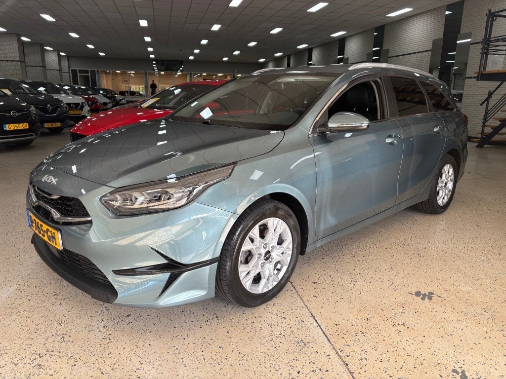Kia CEED SW 1.0T-GDi MHEV Autom Half Leder Stoel Stuur verw., Auto's, Gebruikt, 1309 kg, Met garantie (alle), Hybride Elektrisch/Benzine