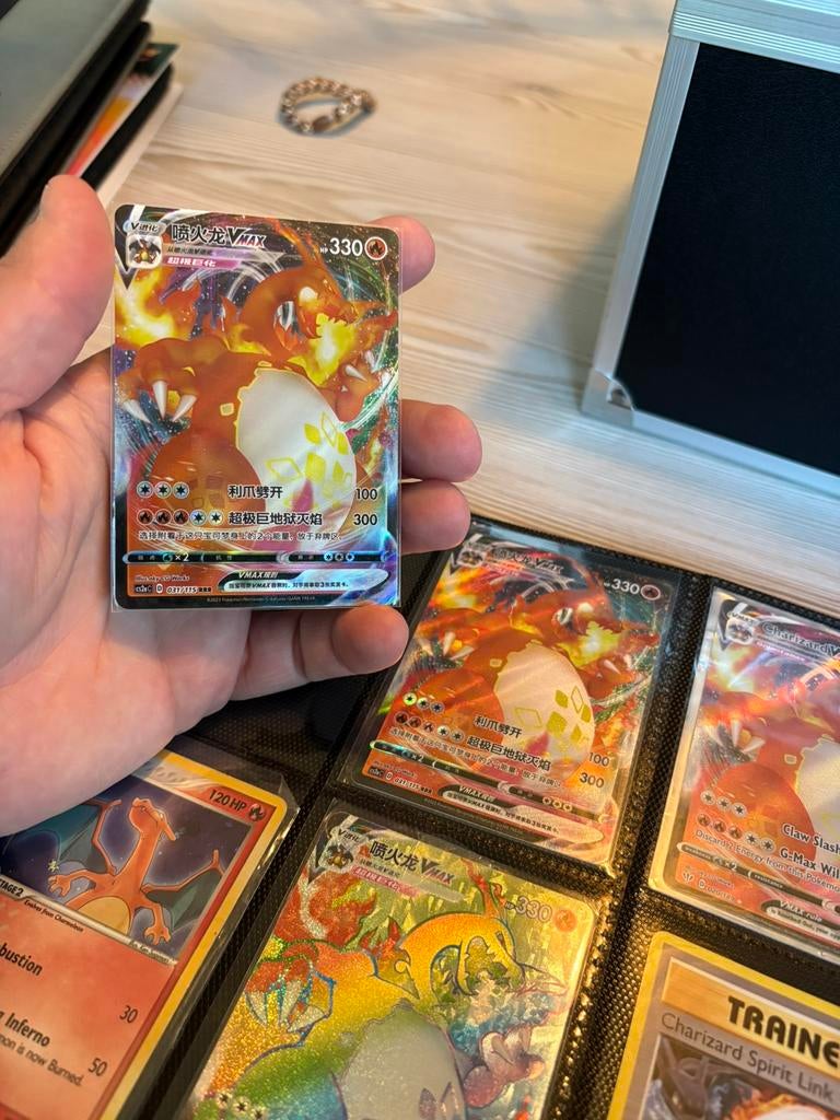 Charizard vmax darkness ablaze, Ophalen of Verzenden, Zo goed als nieuw, Meerdere kaarten, Foil