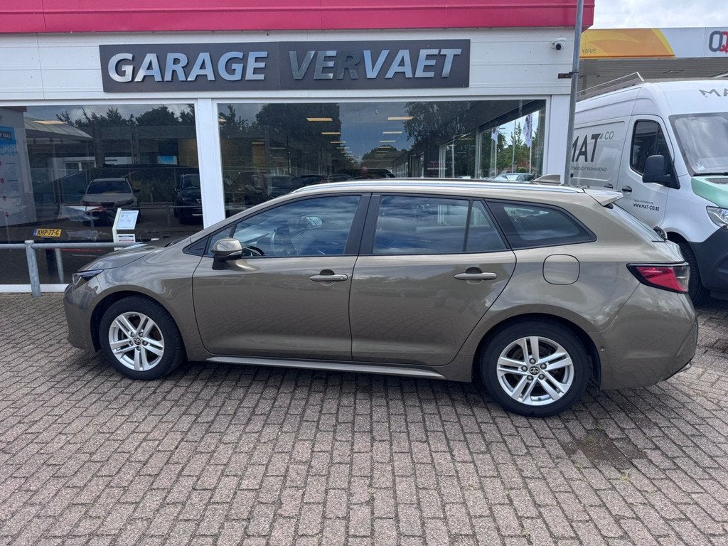Toyota Corolla Touring Sports 1.8 Hybrid Business (bj 2023), 1345 kg, Gebruikt, 4 cilinders, Corolla