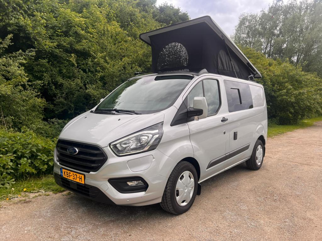 Ford transit custom PHEV camper. 20.500km, Caravans en Kamperen, Campers, Automaat, Buscamper of Camperbus, Ford, Tot en met 2