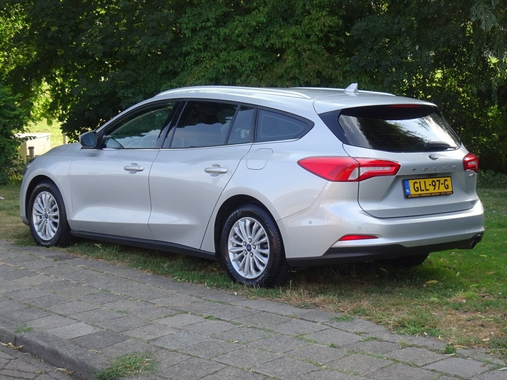 Ford FOCUS Wagon 1.0 125pk Hybrid Titanium met Navi, Camera, Stof, Gebruikt, Euro 6, Automatische klimaatregeling