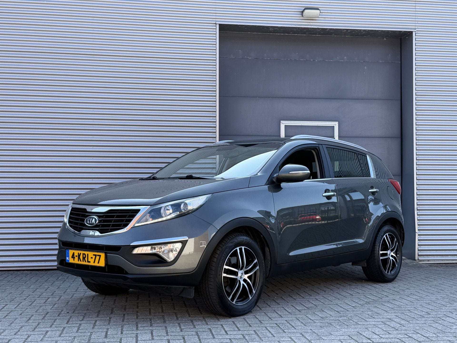 Kia Sportage 1.6 GDI Plus Pack I Climate Control I Cruise Co, Auto's, Voorwielaandrijving, Euro 5, 4 cilinders, Origineel Nederlands