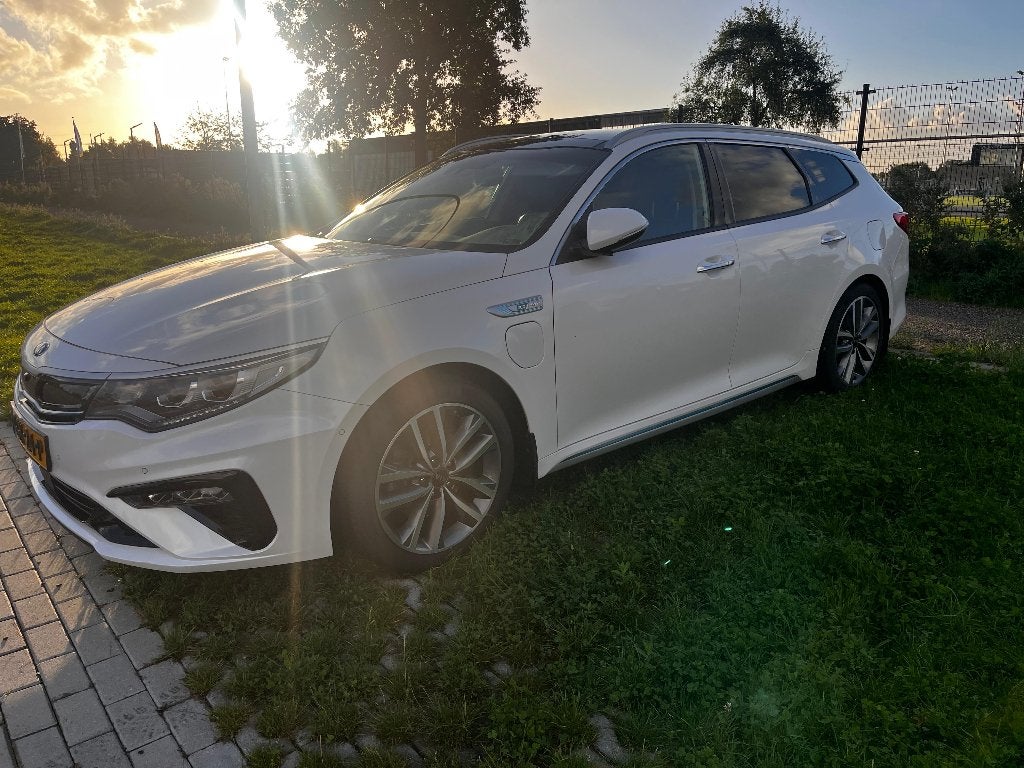 Kia Optima Sportswagon 2.0 Phev 205pk bomvol executive, Auto's, Dealer onderhouden, Wit, Geïmporteerd, Optima Sportswagon
