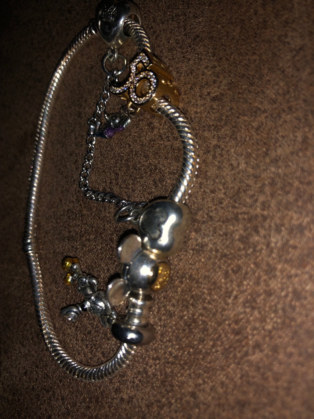 Disney bedelarmband met zilveren bedels, maat 20, Ophalen of Verzenden, Gebruikt, Zilver, Met bedels of kralen