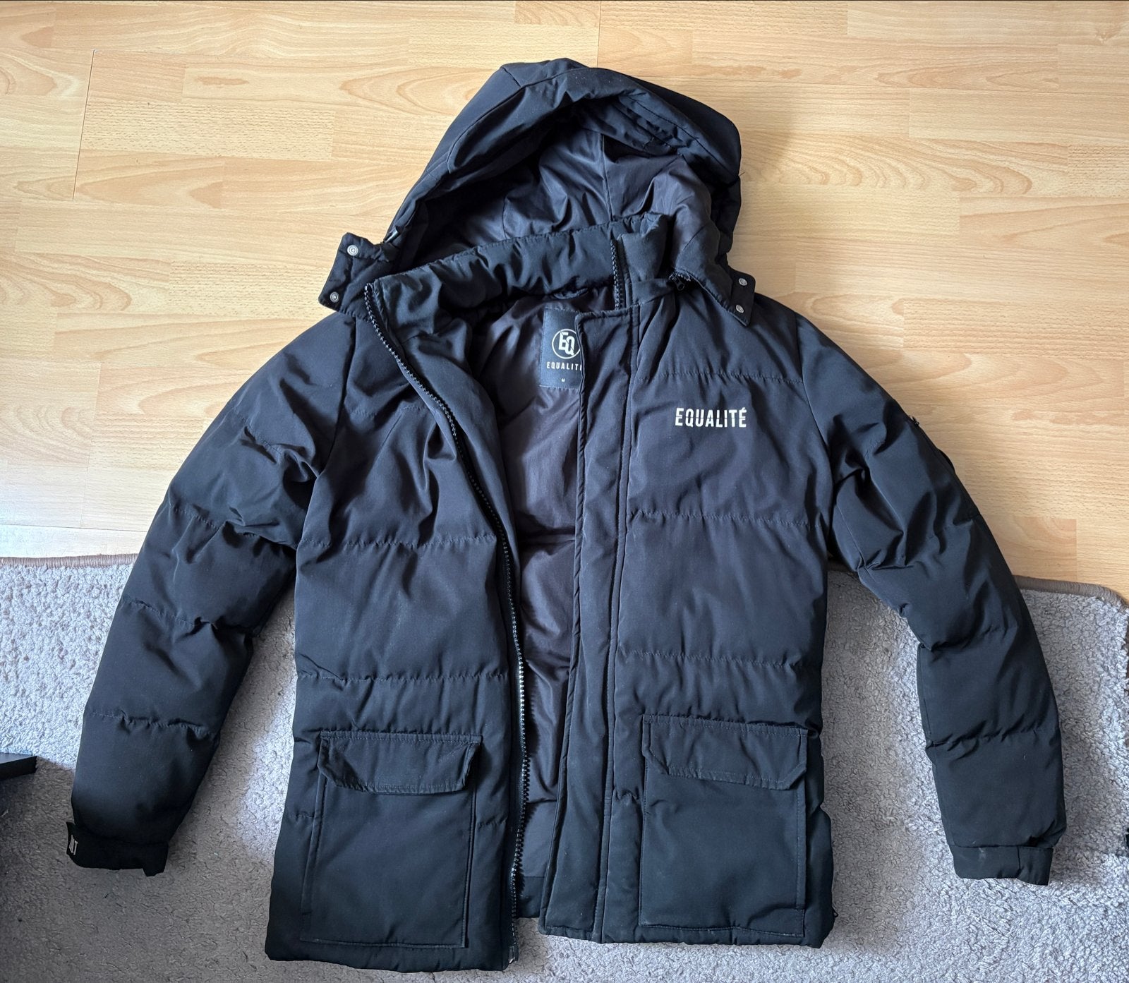 EQUALITÉ Zwarte Winterjas Maat M, Kleding | Heren, Ophalen of Verzenden, Zo goed als nieuw, Maat 48/50 (M), Zwart