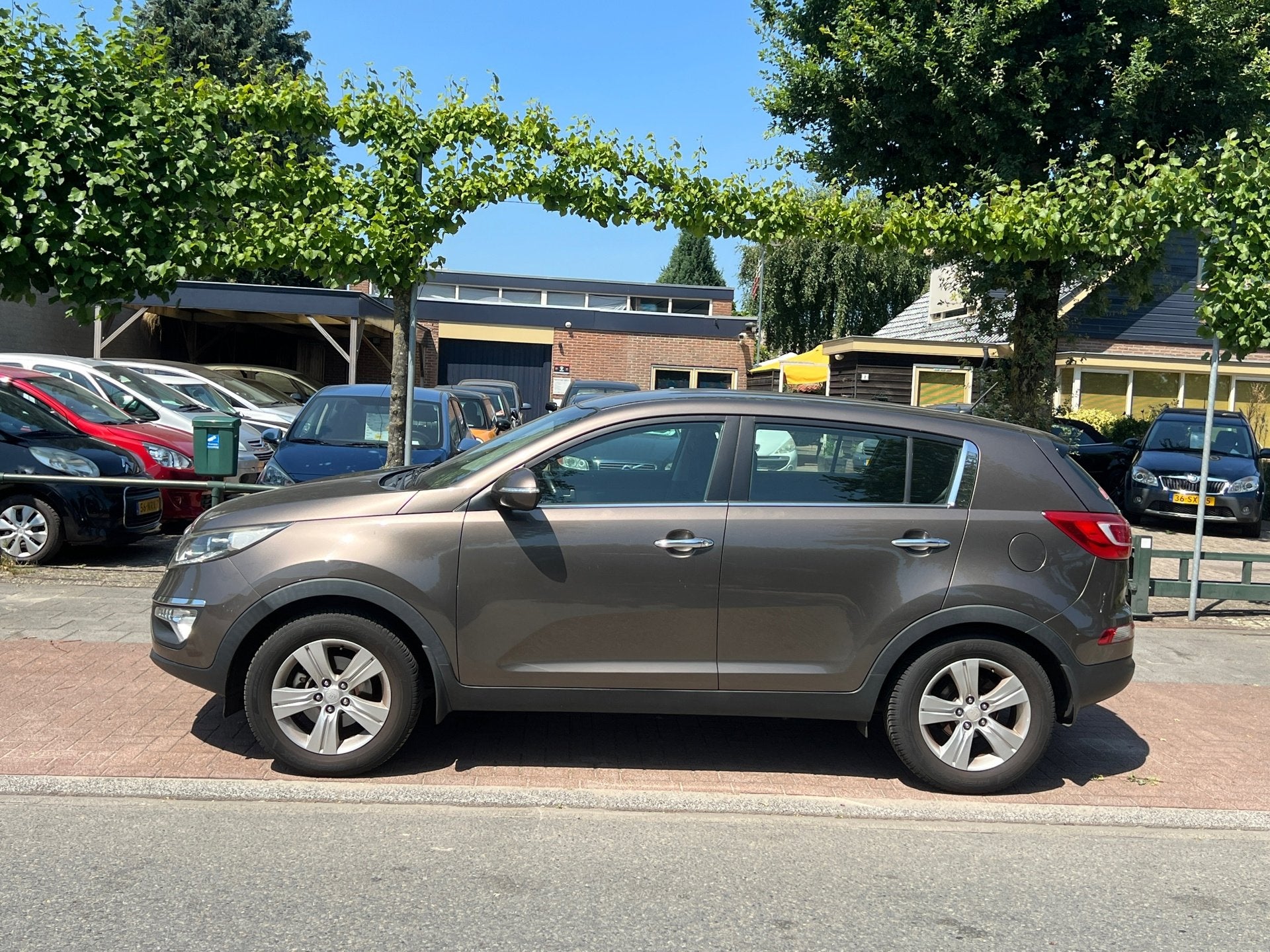 Kia Sportage 2.0 X-ecutive *TG 1900kg I APK 7-2027, Gebruikt, 4 cilinders, Bruin, 163 pk