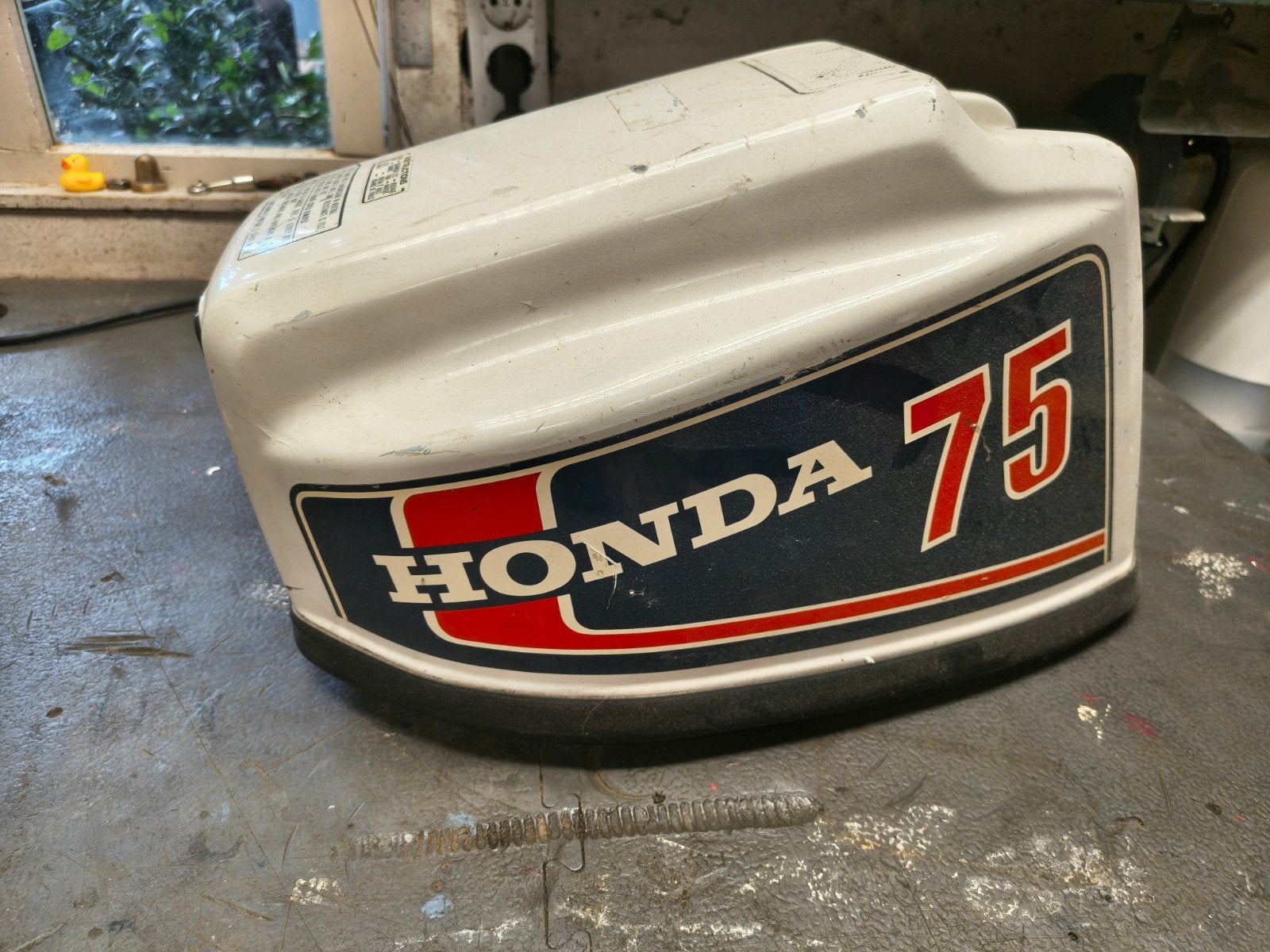 motorkap Honda buitenboordmotor, Ophalen