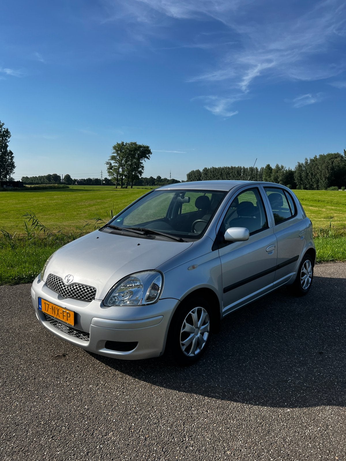 Toyota Yaris 1.3 16V Vvti 5DR AUT 2004 Grijs, Auto's, 31 €/maand, 4 cilinders, 400 kg, Origineel Nederlands