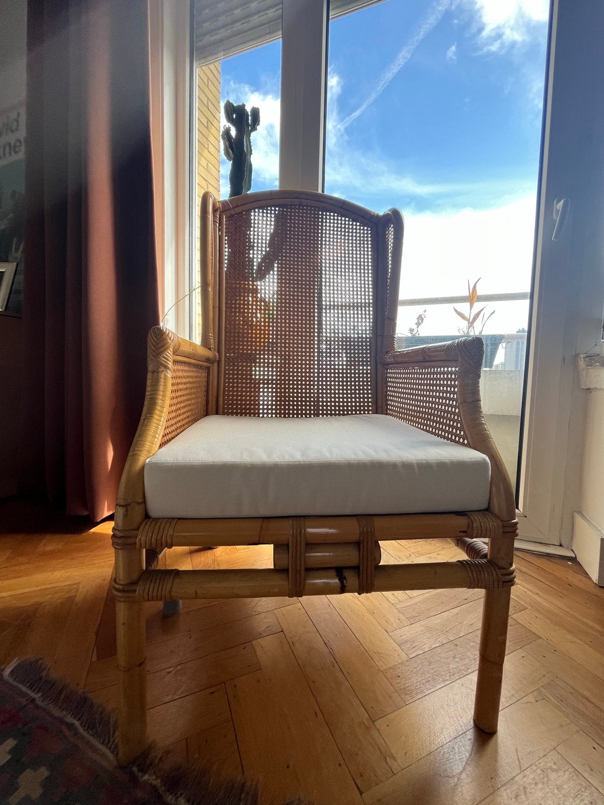 Vintage rotan fauteuil met webbing en nieuw kussen, Ophalen
