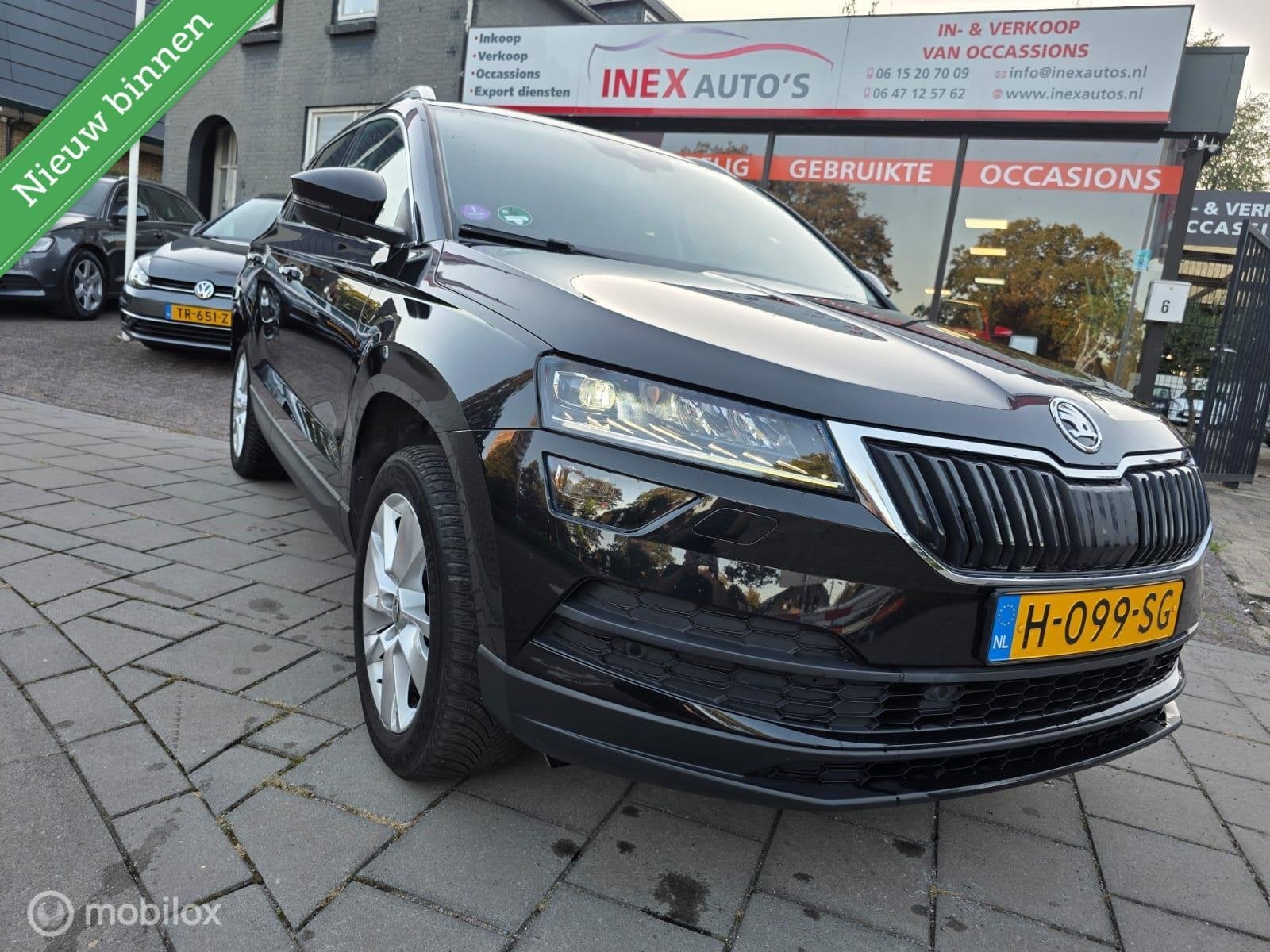 Skoda Karoq 1.5 TSI ACT Sportline Business Keyless Carplay D, Auto's, Dealer onderhouden, 4 cilinders, 150 pk, Zwart