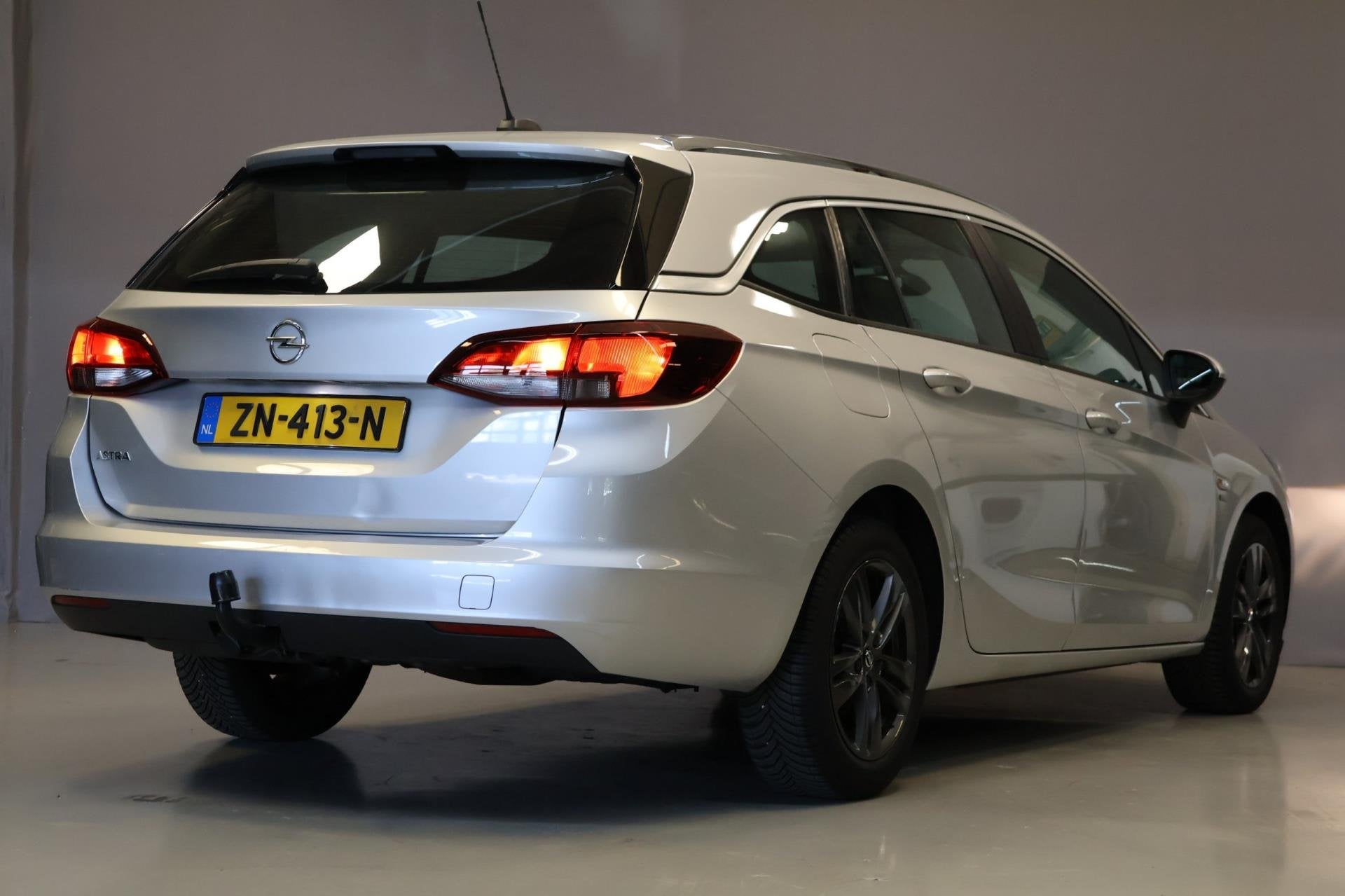 Opel Astra Sports Tourer 1.4 Turbo 120 Jahre|Automaat|Pano|C, Stof, Gebruikt, 150 pk, Origineel Nederlands