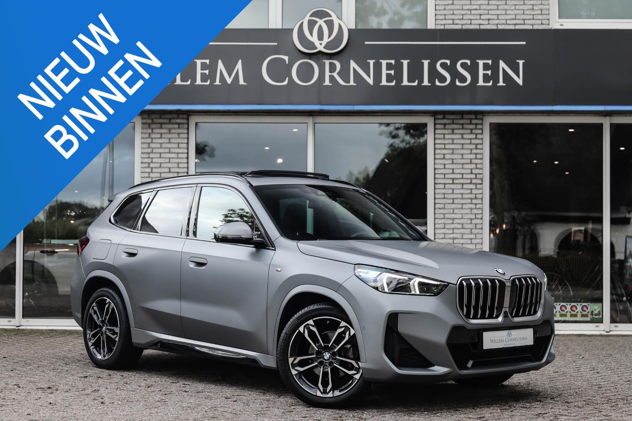 BMW X1 sDrive18i Frozen Grey M-Sport Pano Leer HUD Har/Ka, Dealer onderhouden, Gebruikt, Origineel Nederlands, Bedrijf