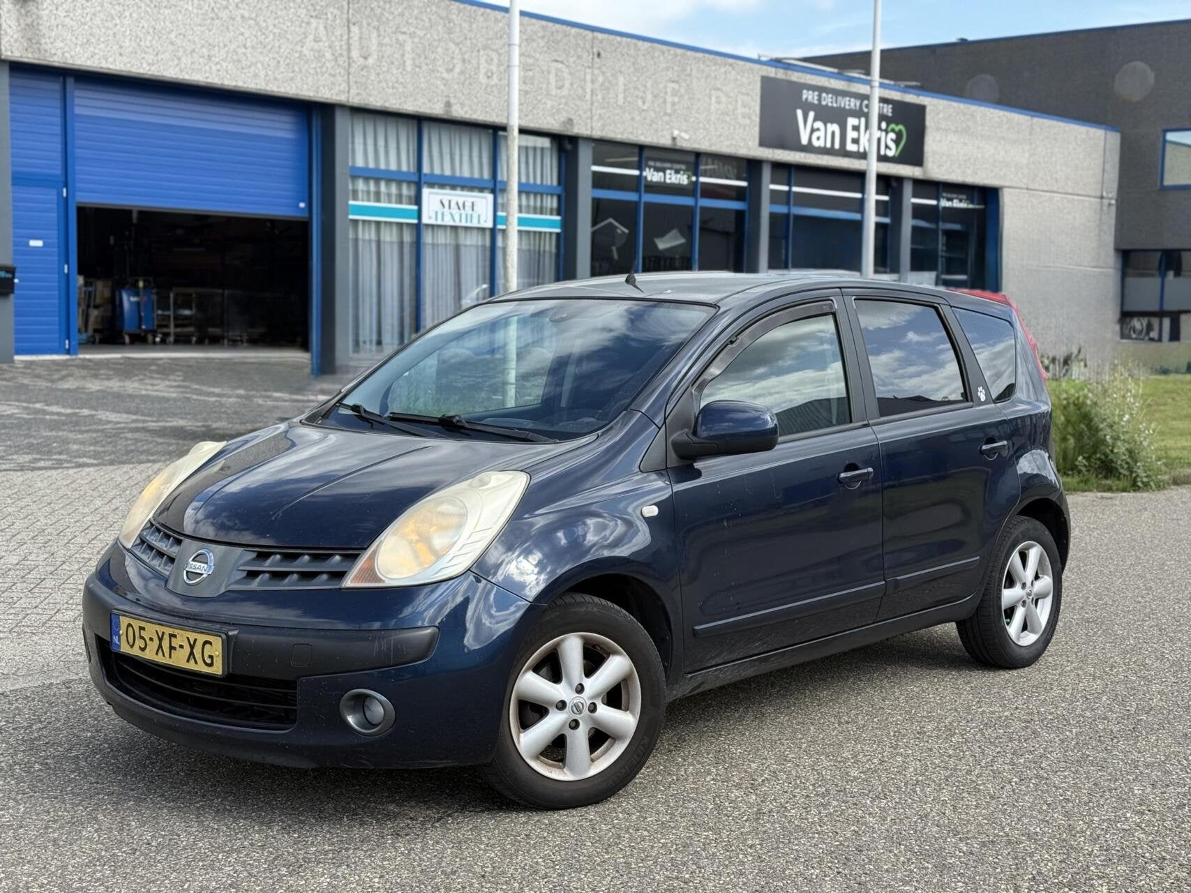 Nissan Note 1.4 5-DRS Airco Elektrische pakket NL Auto, Auto's, Voorwielaandrijving, 4 cilinders, Blauw, Bedrijf