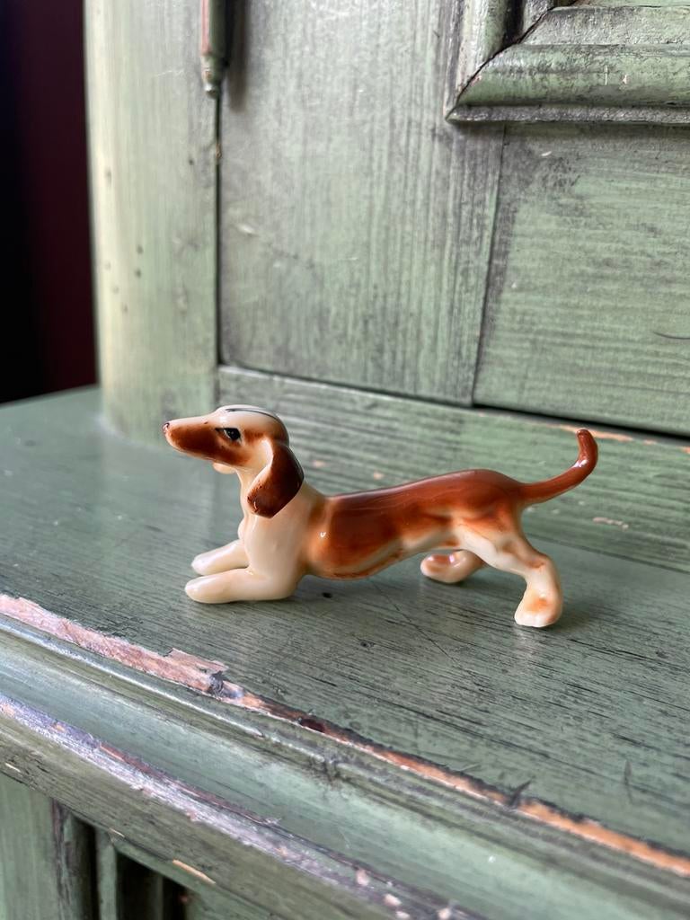 Teckel porselein beeldje., Ophalen of Verzenden, Zo goed als nieuw, Hond of Kat, Beeldje of Figuurtje