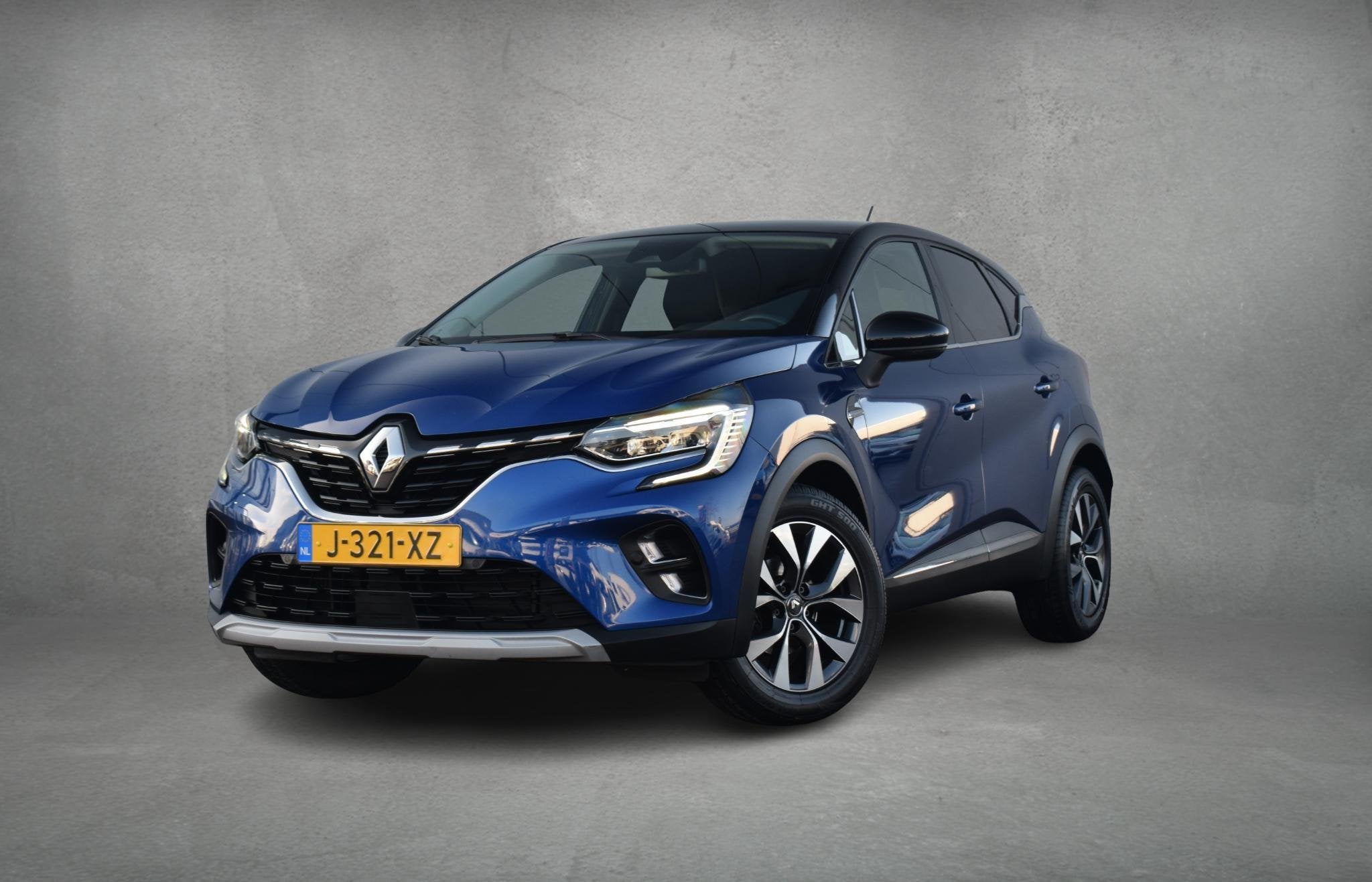 Renault Captur 1.0 TCe 100 Intens | Half Leer | Camera | Cli, Auto's, Gebruikt, 1165 kg, Blauw, Origineel Nederlands