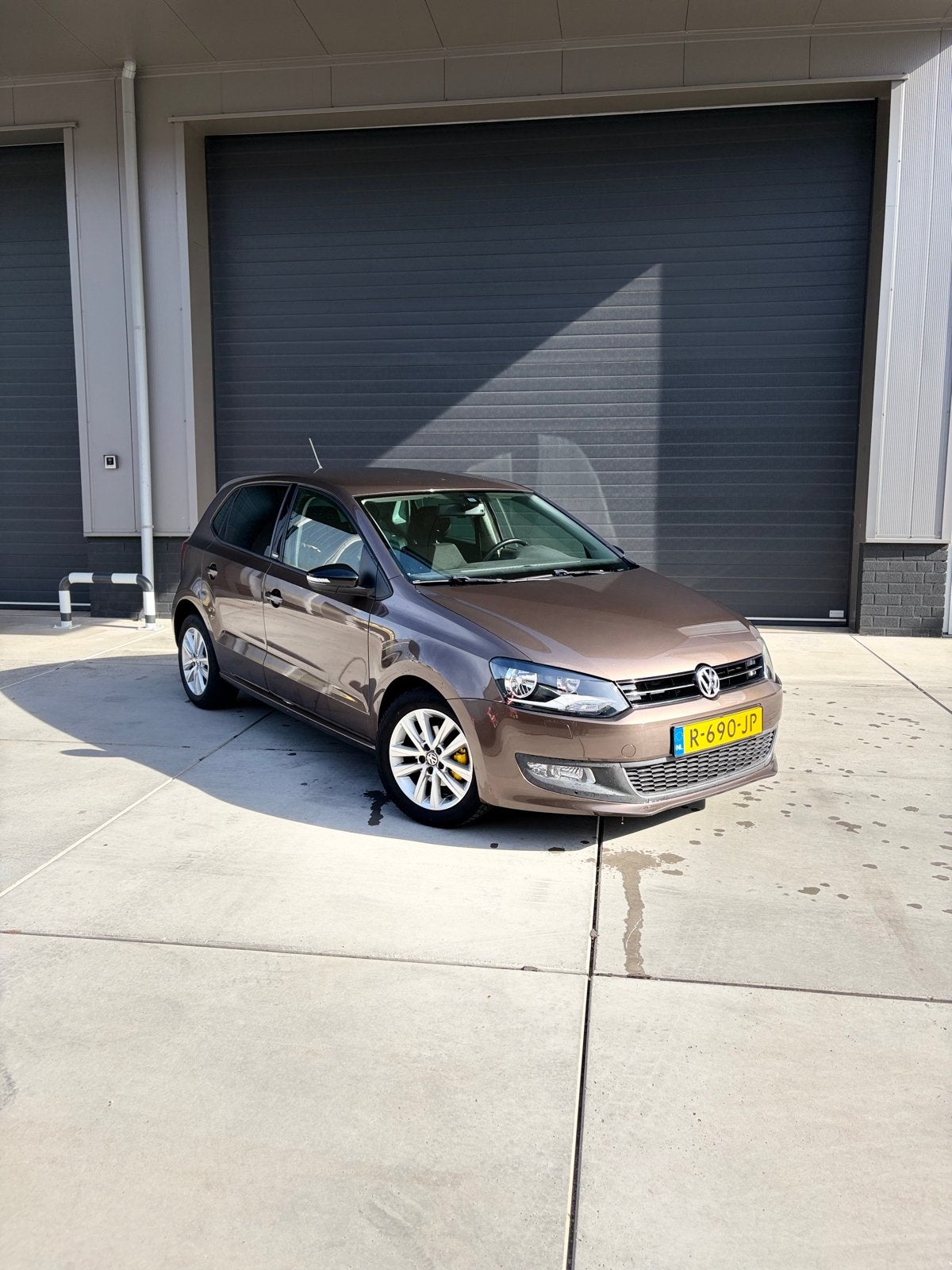 Volkswagen Polo 1.2 51KW 2011 Bruin, Auto's, Voorwielaandrijving, 967 kg, 40 €/maand, Bruin