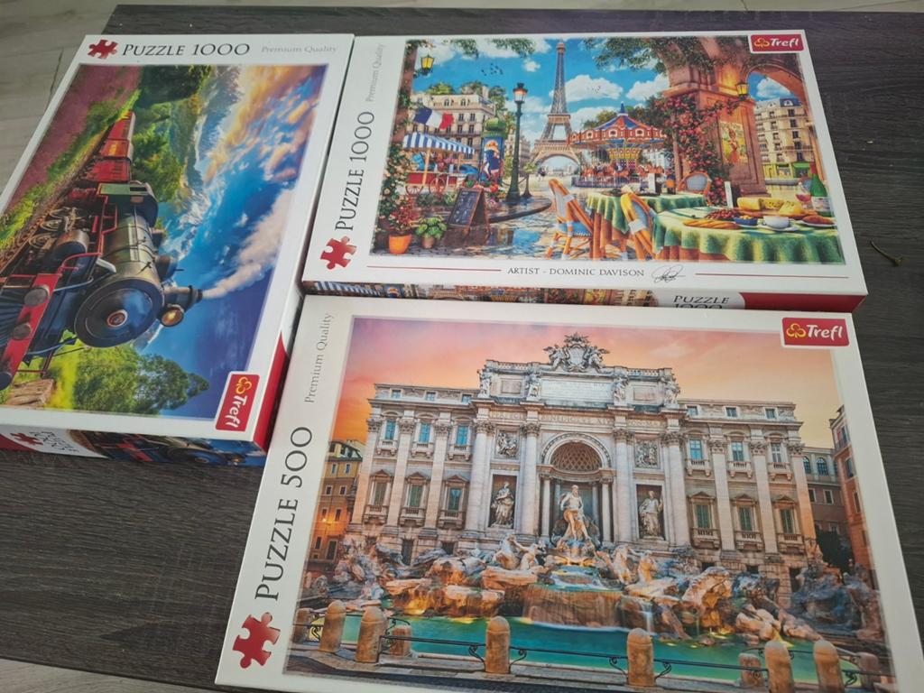 Trefl Puzzels: 2x 1000 stukjes, 1x 500 stukjes, Ophalen of Verzenden, 500 t/m 1500 stukjes, Gebruikt, Legpuzzel