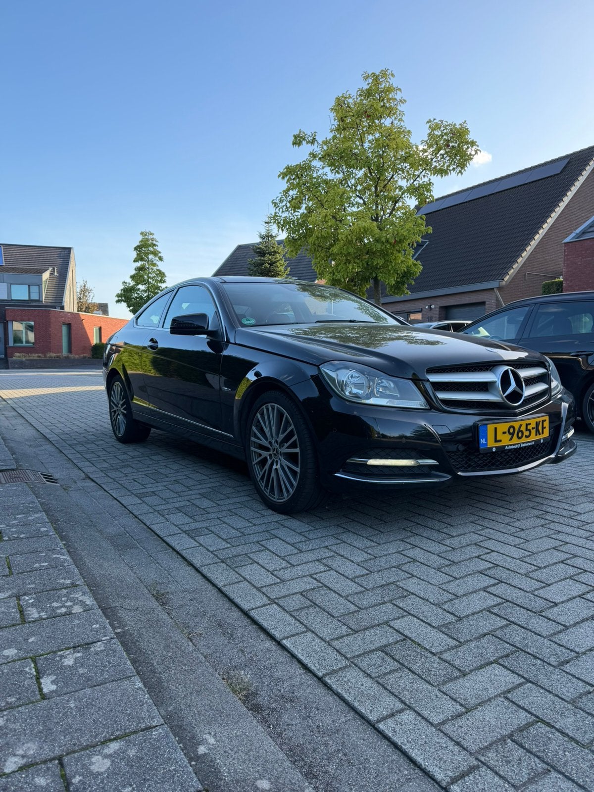 Mercedes-Benz C-Klasse 1.8 C180 CGI Sportcoupe AUT 2011, Auto's, Automaat, Dealer onderhouden, Zwart, 4 cilinders