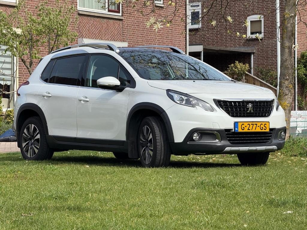 Peugeot 2008 1.2 PureTech | Pano | Full leer | Navi + Cam, 1250 kg, 1199 cc, 610 kg, Leder