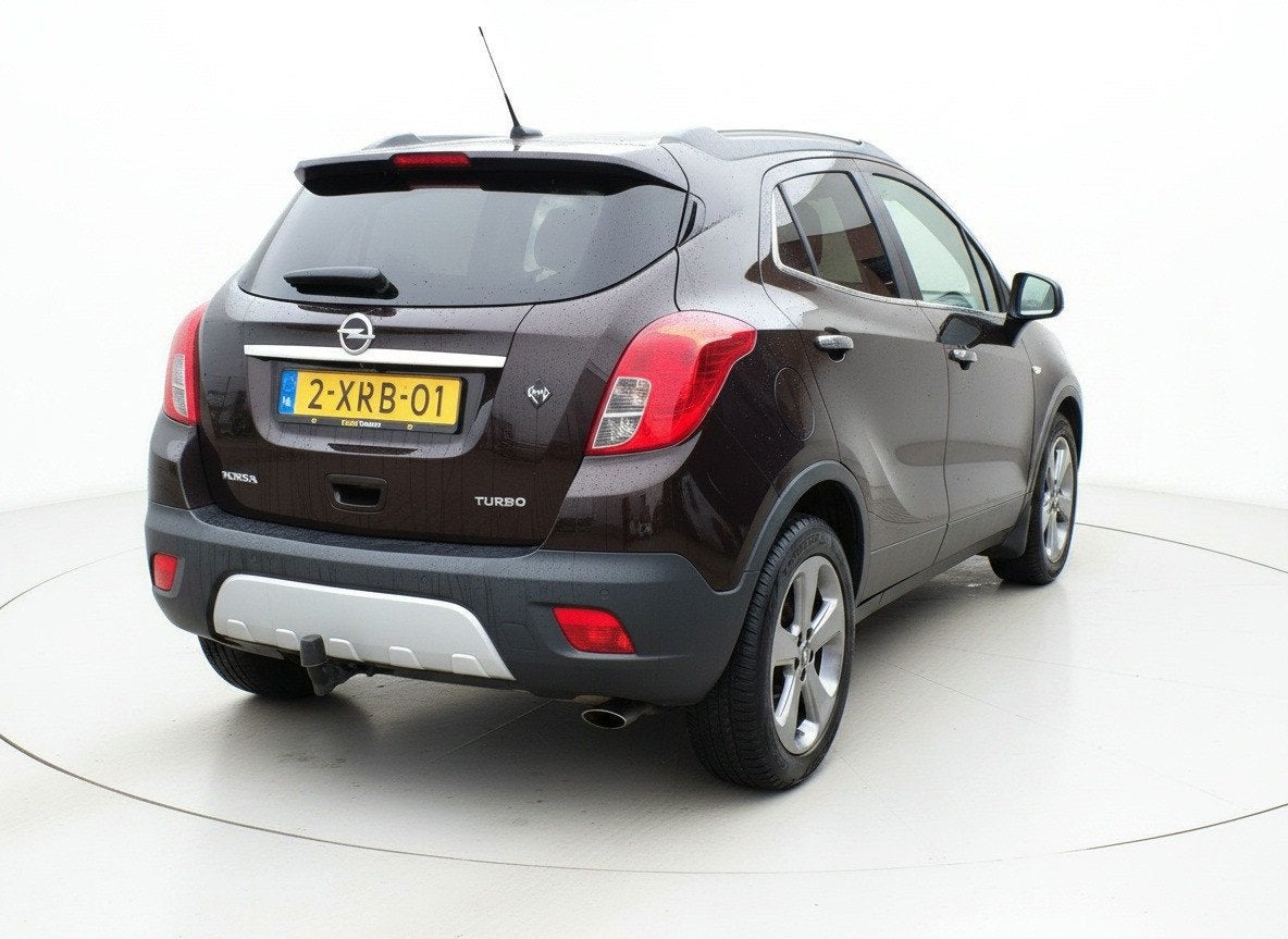 Opel Mokka 1.4 T Cosmo|Cruise|Parkeersensoren|Trekhaak|Airco, Auto's, Voorwielaandrijving, Euro 5, Gebruikt, 4 cilinders
