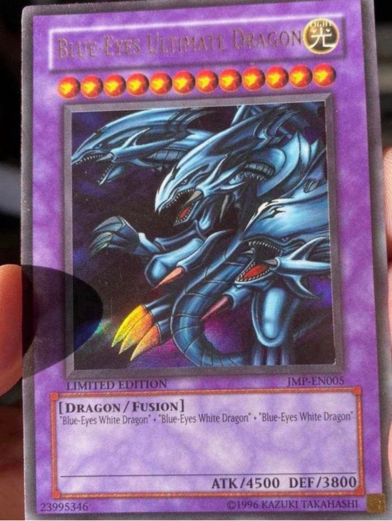 Yu-Gi-Oh! Blue Eyes Ultimate Dragon JMP Old Jump Promo !, Hobby en Vrije tijd, Ophalen of Verzenden, Gebruikt, Losse kaart, Foil