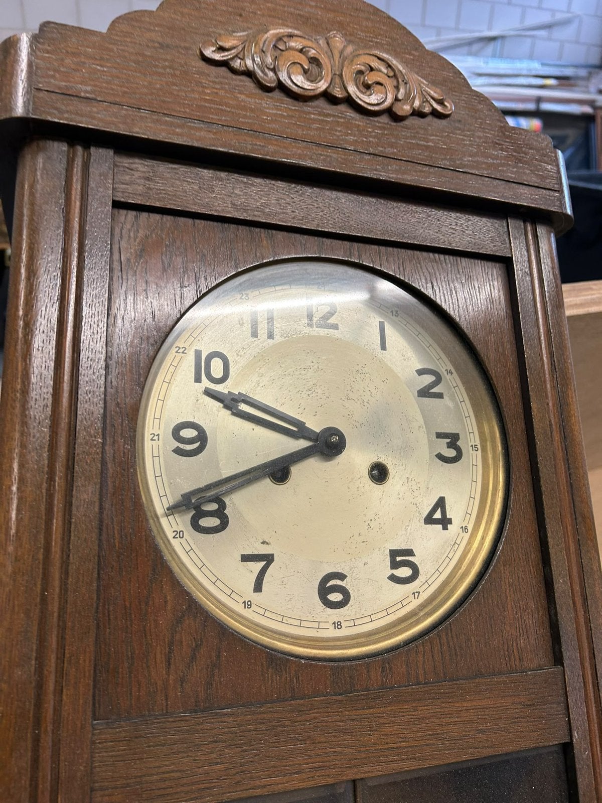 Antieke houten wandklok, Ophalen