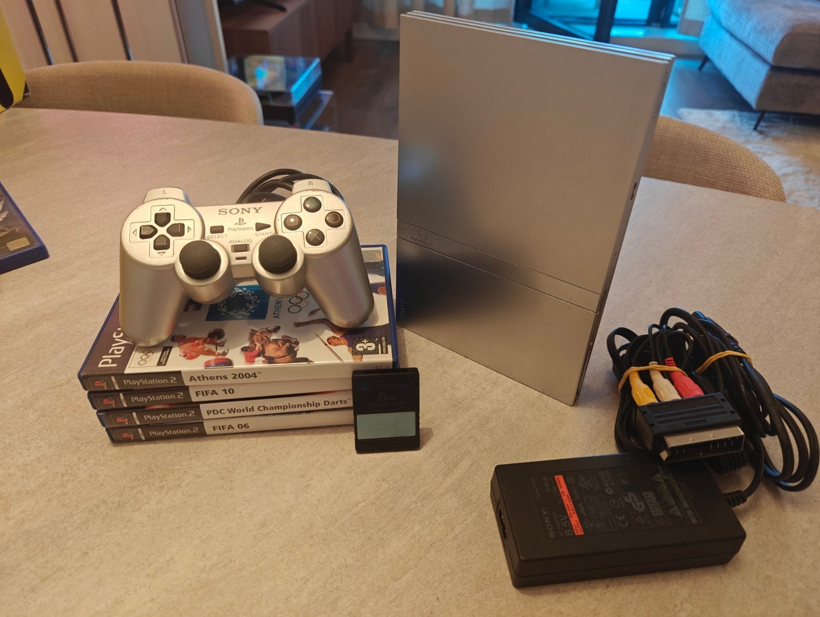PS2 Slim Zilver met games, Ophalen of Verzenden, Gebruikt